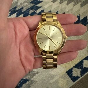 Women’s Michael Kors gold watch